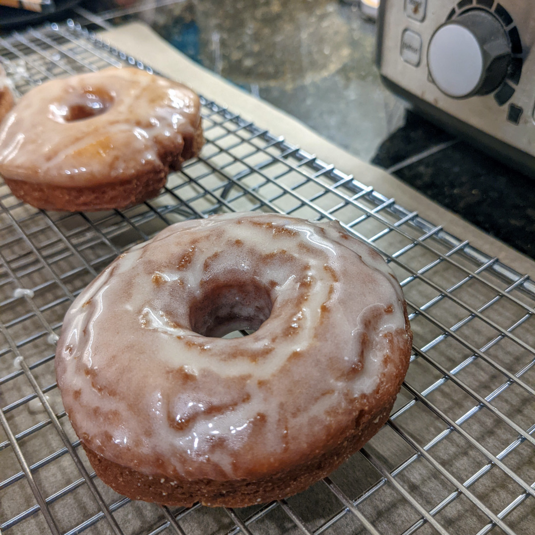 A glazed, slightly overcooked old fashioned donut
