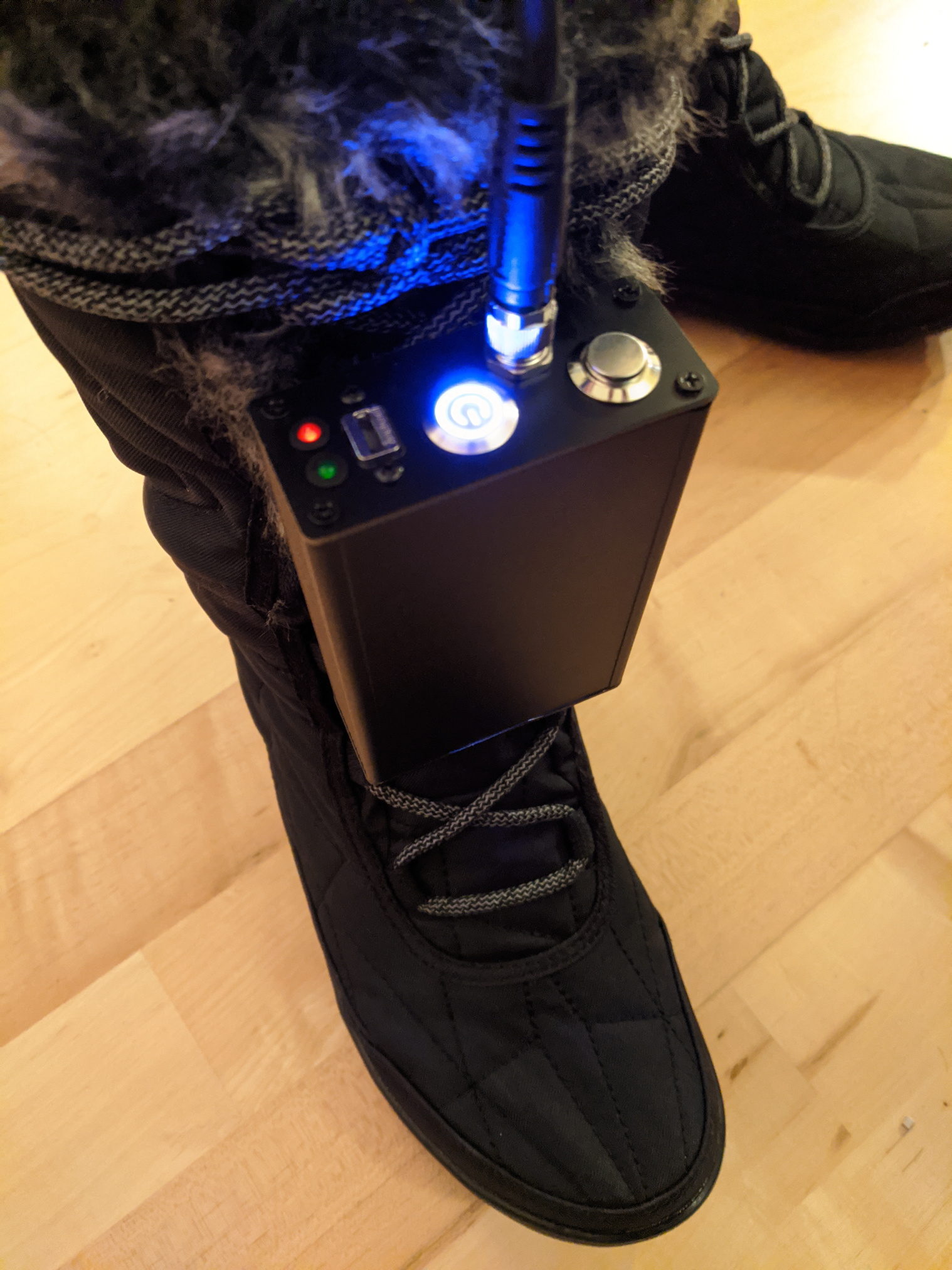 Project enclosure mounted on the front of the right boot.