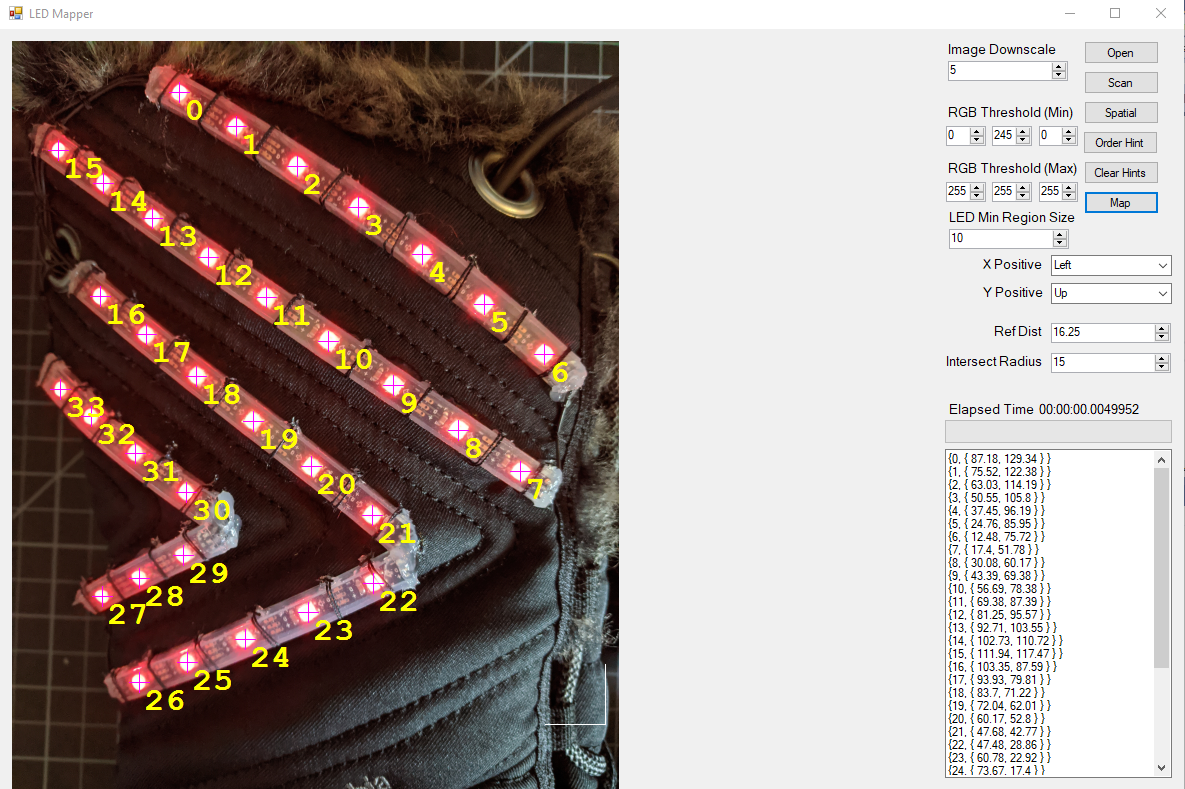 Screenshot of a windows application showing a photo of the right boot with numbers over the LEDs and a control panel to one side.