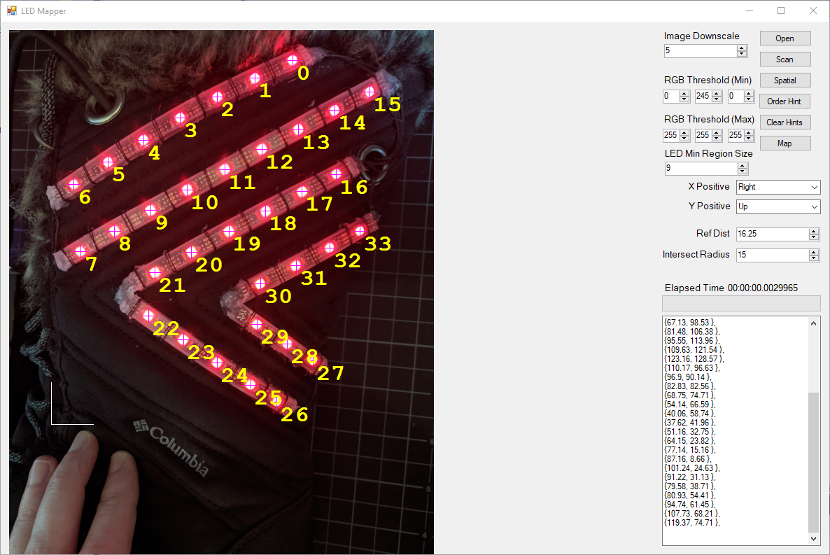 Screenshot of a windows application showing a photo of the left boot with numbers over the LEDs and a control panel to one side.