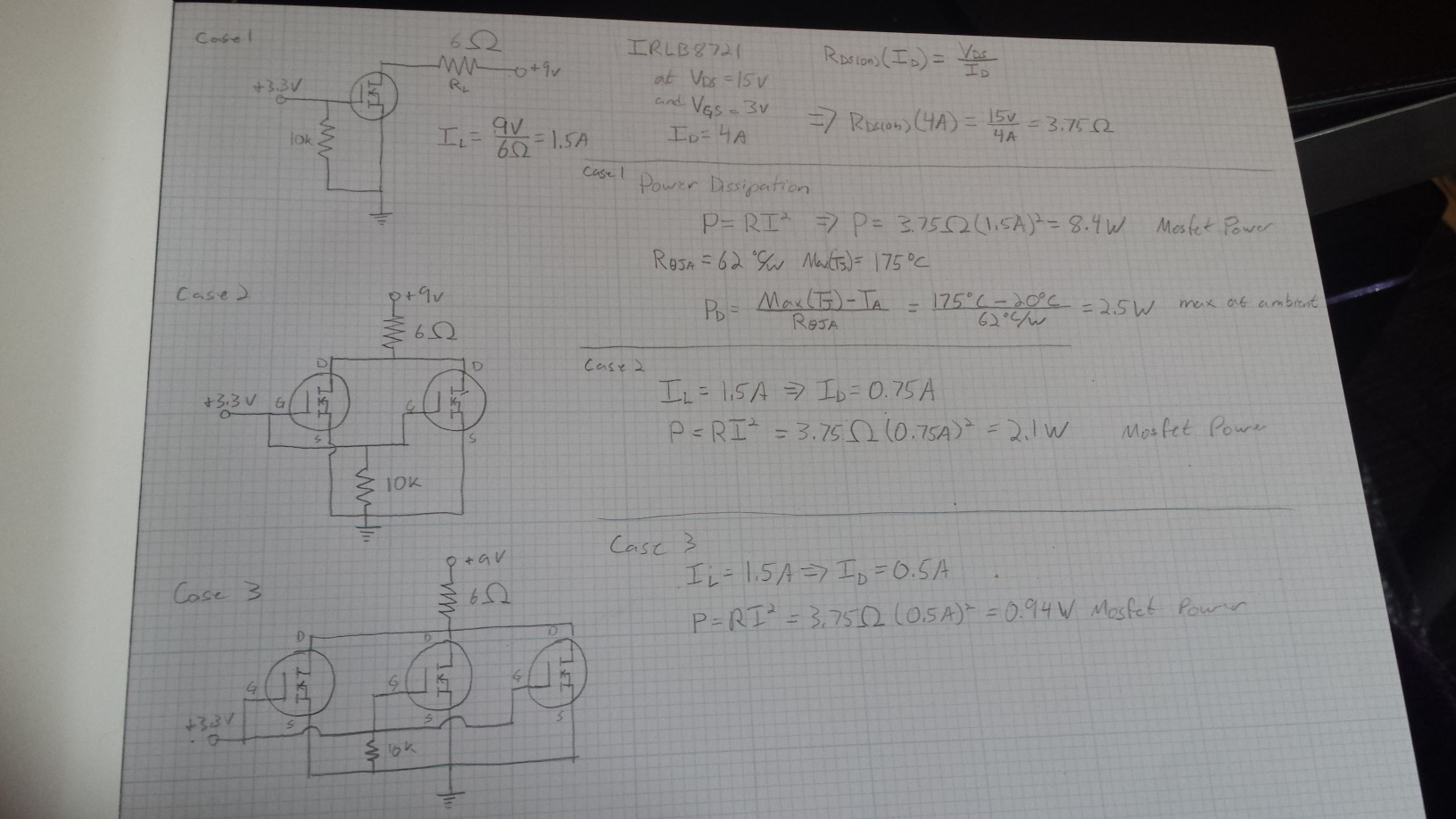 Hand drawn schematics and equations (likely incorrect) on graph paper.